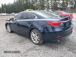 2015 Mazda 6 i Touring with VIN JM1GJ1V52F1185998, listed as a IAAI auction lot 41921373 with 101,306 mi miles and . Bid and sale history available at DreamBid. Image 3.