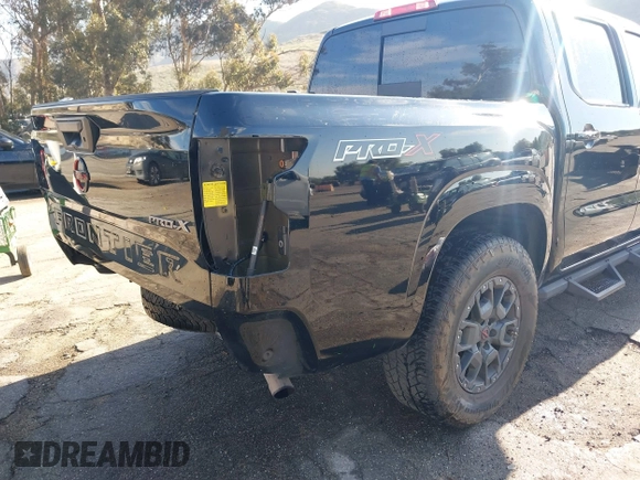 2023 Nissan Frontier Pro-X with VIN 1N6ED1EJ6PN619651, listed as a IAAI auction lot 41838415 with 69,819 mi miles and . Bid and sale history available at DreamBid. Image 6.