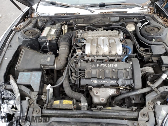 1995 Mitsubishi 3000GT GT z VIN JA3AM84J1SY002174, wystawiony jako Copart lot #41652305 z przebiegiem 272 977 mil mil oraz Szkoda całkowita • Salvage title. Historia ofert i sprzedaży dostępna na DreamBid. Obrazek 13.
