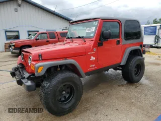 2005 Jeep Wrangler Sport with VIN 1J4FA49S75P317995, listed as a Copart auction lot 58060055 with 189,332 mi miles and Salvage title. Bid and sale history available at DreamBid. Image 1.