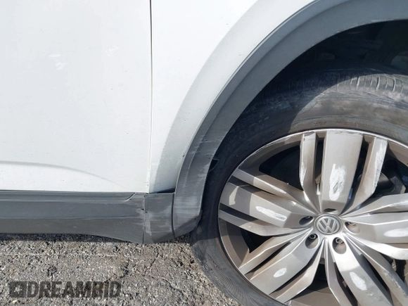 2019 Volkswagen Atlas SE z VIN 1V2WR2CA8KC504134, wystawiony jako IAAI lot #41700050 z przebiegiem 97 047 mil mil oraz . Historia ofert i sprzedaży dostępna na DreamBid. Obrazek 17.