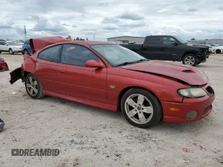 2006 Pontiac GTO z VIN 6G2VX12U66L564449, wystawiony jako Copart lot #71022094 z przebiegiem 179 964 mil mil oraz Szkody całkowita. Historia ofert i sprzedaży dostępna na DreamBid. Obrazek 4.