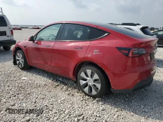 2021 Tesla Model Y Standard Range with VIN 5YJYGDED5MF116562, listed as a Copart auction lot 51211535 with 68,549 mi miles and Salvage Title. Bid and sale history available at DreamBid. Image 2.