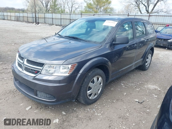 2014 Dodge Journey SE with VIN 3C4PDCAB1ET219760, listed as a IAAI auction lot 42013441 with 106,212 mi miles and . Bid and sale history available at carsss.com. Image 18.
