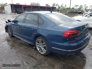 2018 Volkswagen Passat 2.0T S with VIN 1VWAA7A30JC021740, listed as a IAAI auction lot 41887035 with 65,227 mi miles. Bid and sale history available at carsss.com. Image 3.