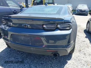 2020 Chevrolet Camaro 1LT with VIN 1G1FA1RX4L0140613, listed as a IAAI auction lot 41577677 with 30,571 mi miles and . Bid and sale history available at carsss.com. Image 16.
