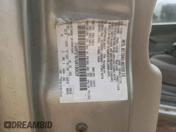 2006 Ford Focus S with VIN 1FAHP37N76W180039, listed as a Copart auction lot 58328565 with 220,696 mi miles and Salvage title. Bid and sale history available at DreamBid. Image 14.