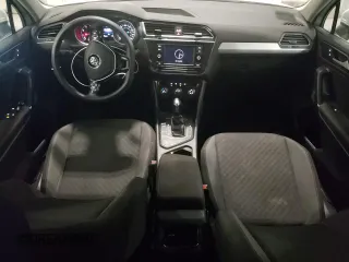2018 Volkswagen Tiguan S with VIN 3VV1B7AX4JM118670, listed as a Copart auction lot 57055935 with 104,443 mi miles and Salvage title. Bid and sale history available at DreamBid. Image 8.