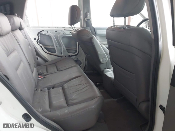 2009 Honda CR-V EX-L with VIN JHLRE387X9C003580, listed as a IAAI auction lot 41945794 with 131,061 mi miles. Bid and sale history available at carsss.com. Image 8.