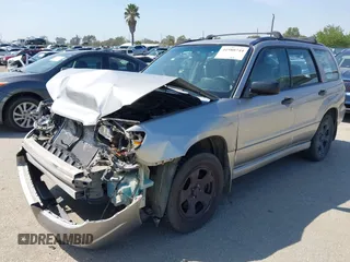 2006 Subaru Forester 2.5 X with VIN JF1SG63646H704810, listed as a IAAI auction lot 41980744 with 117,297 mi miles. Bid and sale history available at carsss.com. Image 2.
