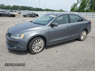2012 Volkswagen Jetta SEL с VIN 3VWLX7AJ7CM408180, выставлен на аукционе Copart как лот 56209565 с пробегом 180 482 миль миль и Списание • Salvage title. История ставок и продаж доступна на DreamBid. Изображение 1.