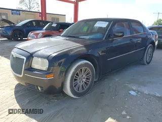 2009 Chrysler 300 Touring with VIN 2C3KA53V59H621936, listed as a IAAI auction lot 42112314 with 198,461 mi miles. Bid and sale history available at carsss.com. Image 2.