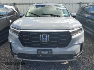 2025 Honda Pilot Elite with VIN 5FNYG1H88SB004011, listed as a Copart auction lot 73641254 with 0 mi miles and Salvage Title. Bid and sale history available at carsss.com. Image 5.