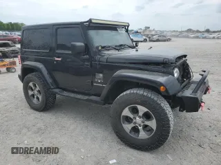2017 Jeep Wrangler Sahara z VIN 1C4AJWBG8HL547512, wystawiony jako Copart lot #53884095 z przebiegiem 107 260 mil mil oraz Szkoda całkowita • Salvage title. Historia ofert i sprzedaży dostępna na DreamBid. Obrazek 4.
