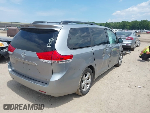 2011 Toyota Sienna LE AAS with VIN 5TDKK3DCXBS156328, listed as a IAAI auction lot 42721542 with 153,286 mi miles and . Bid and sale history available at DreamBid. Image 4.
