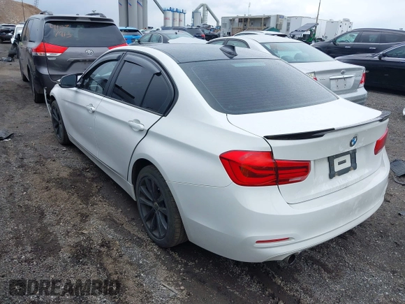 2018 BMW 3 Series 320i xDrive with VIN WBA8E5G52JNU46803, listed as a IAAI auction lot 41869625 with 67,057 mi miles. Bid and sale history available at carsss.com. Image 3.