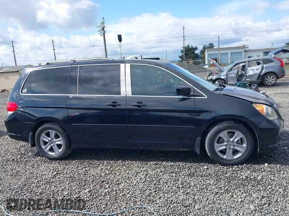 2008 Honda Odyssey Touring with VIN 5FNRL38988B116806, listed as a IAAI auction lot 41920934 with 181,841 mi miles and . Bid and sale history available at DreamBid. Image 13.
