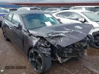 2014 Cadillac ATS Standard RWD z VIN 1G6AA5RX9E0101644, wystawiony jako IAAI lot #42333033 z przebiegiem Nie podano mil oraz . Historia ofert i sprzedaży dostępna na DreamBid. Obrazek 1.