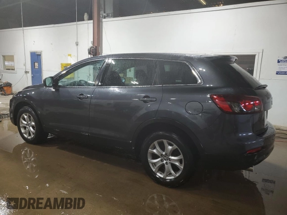 2015 Mazda CX-9 Sport with VIN JM3TB3BA0F0457583, listed as a Copart auction lot 54334135 with 144,767 mi miles and Salvage Title. Bid and sale history available at carsss.com. Image 2.