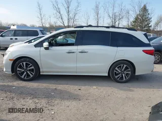 2019 Honda Odyssey Elite with VIN 5FNRL6H90KB019835, listed as a IAAI auction lot 42054752 with 110,659 mi miles and . Bid and sale history available at DreamBid. Image 14.