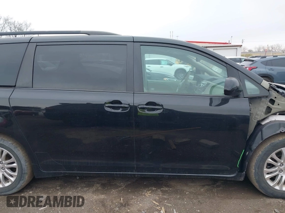 2011 Toyota Sienna XLE AAS with VIN 5TDYK3DC9BS071636, listed as a IAAI auction lot 41972332 with 204,477 mi miles and . Bid and sale history available at DreamBid. Image 14.