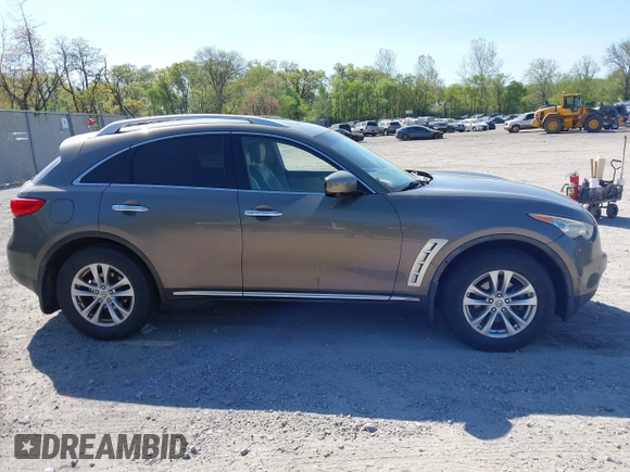 2011 Infiniti FX35 with VIN JN8AS1MW0BM141914, listed as a IAAI auction lot 42151160 with 211,708 mi miles. Bid and sale history available at carsss.com. Image 13.
