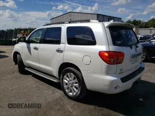 2010 Toyota Sequoia Platinum with VIN 5TDYY5G15AS024882, listed as a Copart auction lot 73760524 with 239,395 mi miles and Salvage Title. Bid and sale history available at carsss.com. Image 2.