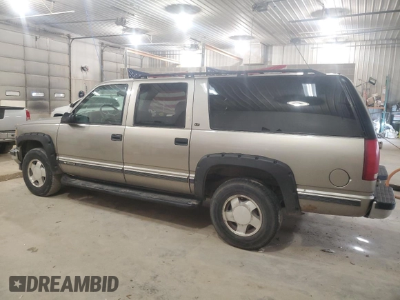 1999 Chevrolet Suburban z VIN 3GNFK16R4XG250550, wystawiony jako Copart lot #51941515 z przebiegiem 202 667 mil mil oraz Szkoda całkowita • Salvage title. Historia ofert i sprzedaży dostępna na DreamBid. Obrazek 2.