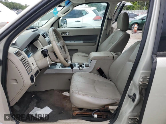 2009 Mercury Mariner Premier with VIN 4M2CU87GX9KJ20726, listed as a Copart auction lot 58690305 with 174,698 mi miles and Salvage title. Bid and sale history available at DreamBid. Image 7.