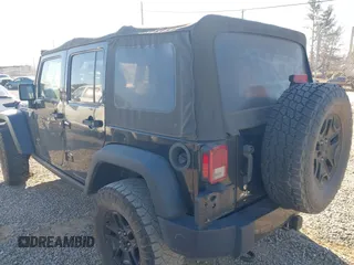 2016 Jeep Wrangler Unlimited Sport with VIN 1C4BJWDG0GL123581, listed as a IAAI auction lot 41426577 with 102,301 mi miles and . Bid and sale history available at DreamBid. Image 3.