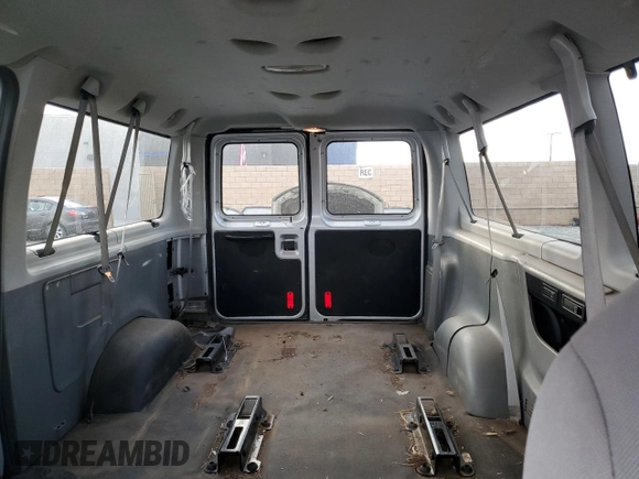 2009 Ford Econoline Passenger XL with VIN 1FBNE31L39DA86660, listed as a Copart auction lot 43724115 with 562,883 mi miles and Salvage title. Bid and sale history available at DreamBid. Image 10.