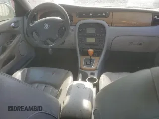 2002 Jaguar X-Type z VIN SAJEA51C02WC53526, wystawiony jako Copart lot #53761265 z przebiegiem 156 584 mil mil oraz Czysty tytuł • Clean title. Historia ofert i sprzedaży dostępna na DreamBid. Obrazek 8.