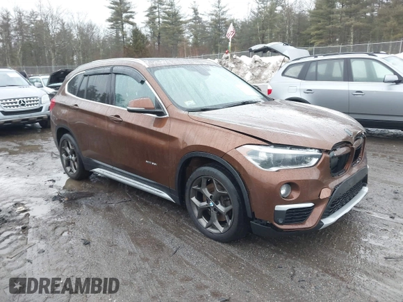2016 BMW X1 xDrive28i with VIN WBXHT3C31GP881488, listed as a IAAI auction lot 41693116 with 120,922 mi miles. Bid and sale history available at carsss.com. Image 1.