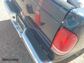 2002 Dodge Dakota SLT with VIN 1B7HL48N32S708719, listed as a IAAI auction lot 42027763 with 217,797 mi miles. Bid and sale history available at carsss.com. Image 6.