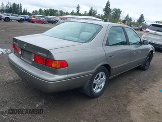 2001 Toyota Camry CE z VIN 4T1BG22K31U097733, wystawiony jako IAAI lot #42276687 z przebiegiem 180 357 mil mil oraz . Historia ofert i sprzedaży dostępna na DreamBid. Obrazek 4.