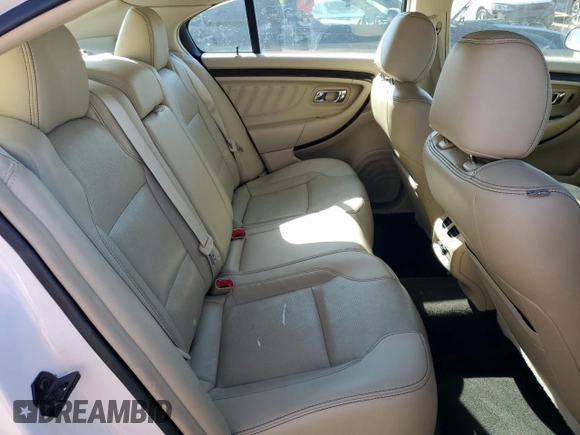 2015 Ford Taurus Limited z VIN 1FAHP2J8XFG123759, wystawiony jako Copart lot #50548205 z przebiegiem 128 266 mil mil oraz Szkoda całkowita • Salvage title. Historia ofert i sprzedaży dostępna na DreamBid. Obrazek 10.