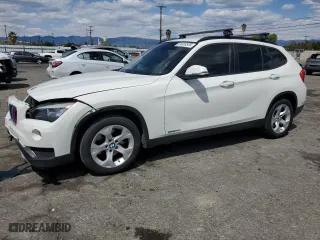 2014 BMW X1 sDrive28i with VIN WBAVM1C52EVW48180, listed as a Copart auction lot 51653535 with 113,793 mi miles and Salvage Title. Bid and sale history available at carsss.com. Image 1.