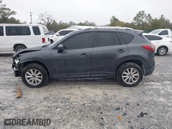 2015 Mazda CX-5 Touring with VIN JM3KE2CY4F0435563, listed as a IAAI auction lot 41311988 with 187,183 mi miles. Bid and sale history available at carsss.com. Image 14.