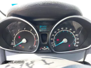 2016 Ford Fiesta SE with VIN 3FADP4BJ4GM101162, listed as a IAAI auction lot 42240414 with 216,099 mi miles and . Bid and sale history available at DreamBid. Image 7.
