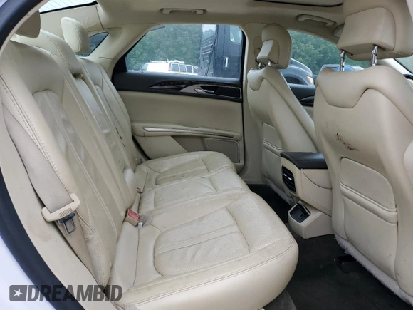 2013 Lincoln MKZ z VIN 3LN6L2J91DR823693, wystawiony jako Copart lot #55827045 z przebiegiem 173 978 mil mil oraz Szkoda całkowita • Salvage title. Historia ofert i sprzedaży dostępna na DreamBid. Obrazek 10.