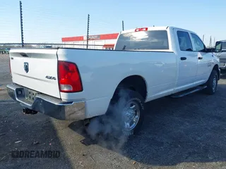 2013 Ram 2500 Tradesman z VIN 3C6TR5HT9DG575642, wystawiony jako IAAI lot #41557823 z przebiegiem 223 859 mil mil oraz . Historia ofert i sprzedaży dostępna na DreamBid. Obrazek 4.