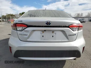 2020 Toyota Corolla Hybrid LE with VIN JTDEBRBE7LJ029233, listed as a Copart auction lot 43476165 with 118,385 mi miles and Salvage Title. Bid and sale history available at carsss.com. Image 6.