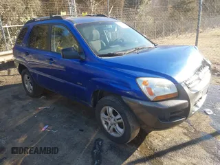 2006 Kia Sportage LX z VIN KNDJE723167219099, wystawiony jako IAAI lot #41660866 z przebiegiem 238 947 mil mil oraz . Historia ofert i sprzedaży dostępna na DreamBid. Obrazek 1.