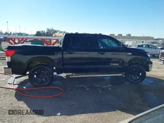 2011 Toyota Tundra z VIN 5TFEY5F12BX115107, wystawiony jako IAAI lot #41426224 z przebiegiem 143 487 mil mil oraz . Historia ofert i sprzedaży dostępna na DreamBid. Obrazek 13.