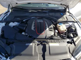 2016 Audi S7 with VIN WAUW2BFCXGN019960, listed as a Copart auction lot 77108064 with 54,635 mi miles and Salvage Title. Bid and sale history available at carsss.com. Image 12.