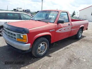 1992 Dodge Dakota "S" with VIN 1B7FL26X3NS677489, listed as a IAAI auction lot 42167931 with 108,582 mi miles. Bid and sale history available at carsss.com. Image 2.