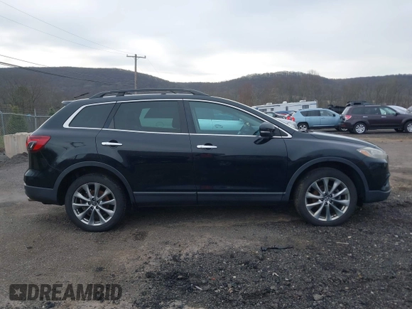 2015 Mazda CX-9 Grand Touring z VIN JM3TB3DV6F0464926, wystawiony jako IAAI lot #42035670 z przebiegiem 168 257 mil mil oraz . Historia ofert i sprzedaży dostępna na DreamBid. Obrazek 13.