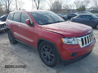 2011 Jeep Grand Cherokee Laredo with VIN 1J4RR4GG6BC527897, listed as a IAAI auction lot 42032975 with 148,875 mi miles. Bid and sale history available at carsss.com. Image 1.