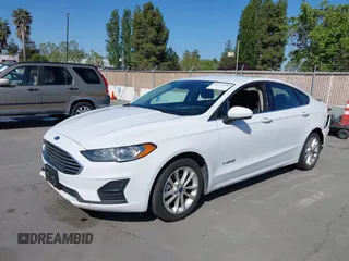 2019 Ford Fusion Hybrid SE with VIN 3FA6P0LU9KR207824, listed as a IAAI auction lot 42153330 with 69,966 mi miles. Bid and sale history available at carsss.com. Image 6.