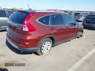 2015 Honda CR-V EX-L with VIN 2HKRM4H7XFH660871, listed as a IAAI auction lot 42095318 with 161,977 mi miles and . Bid and sale history available at carsss.com. Image 4.